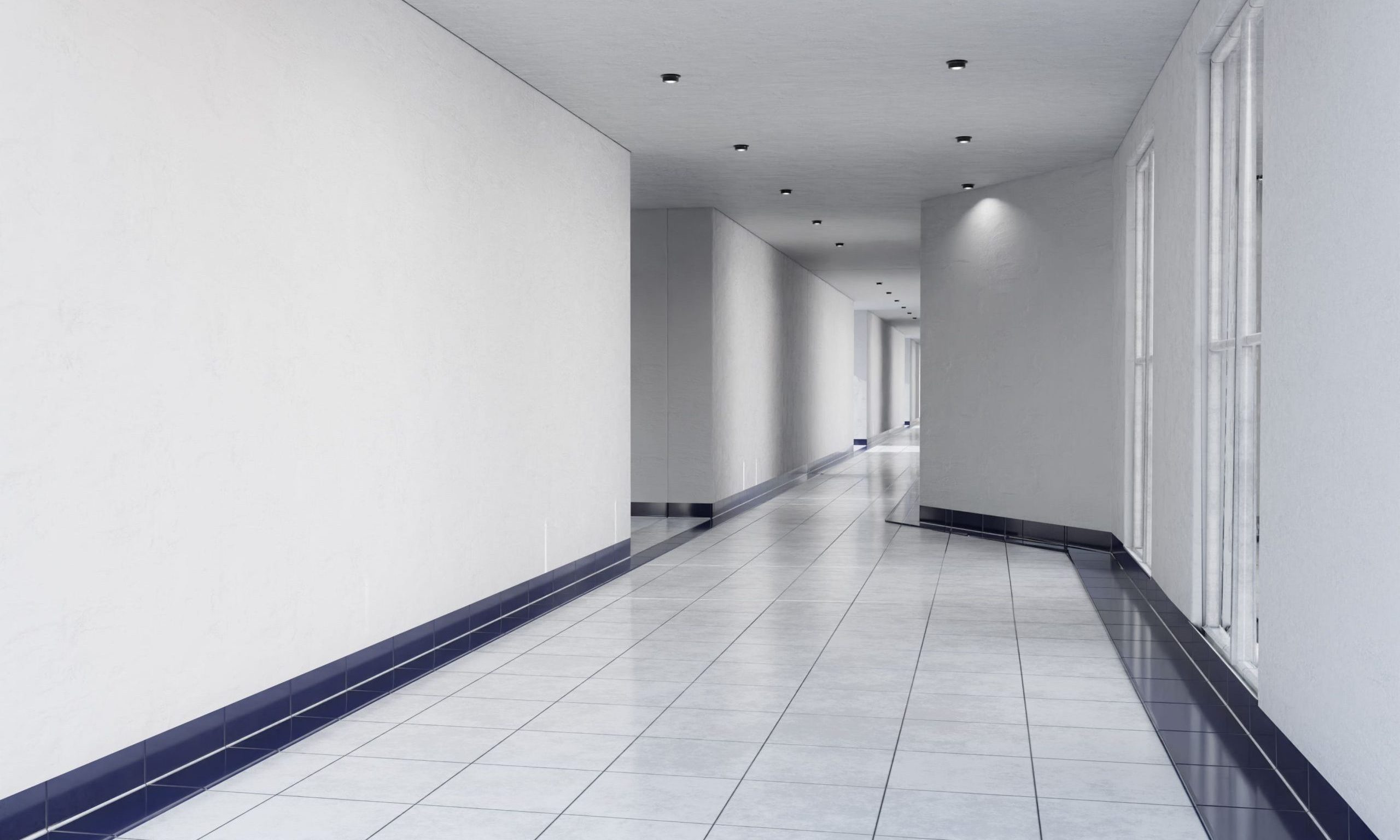 Hallway with tiled walls